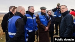 Armenia - Polish President Andrzej Duda (right) talks to EU monitors on Armenia's border with Azerbaijan, November 27, 2024.