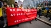 A protest in Lausanne, Switzerland, in 2023 against allowing athletes from Russia and Belarus to participate in the 2024 Olympics in Paris