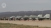 Avioane slovace MiG-29 la baza aeriană Silac din Slovacia. Captură preluată dintr-o înregistrare difuzată de Ministerul Apărării din Slovacia, pe 23 martie 2023.