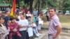Валентин Димитров е кметът на Генерал Тошево. Той разговаря с хората, събрали се в негова защита. 