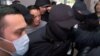 РАйымбек Матраимов после доставления в суд. 