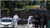 Policija pored tela napadača u blizini Ambasade Izraela, 29. juna 2024.