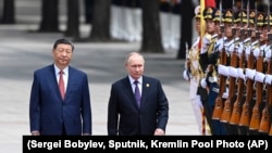 Кинескиот претседател Си Џинпинг и неговиот руски колега Владимир Путин