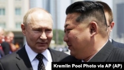Владимир Путин и Ким Џонг-Ун