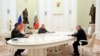 Președintele rus Vladimir Putin, ministrul Apărării Serghei Șoigu și ministrul chinez al Apărării Li Shangfu, la Kremlin, 16 aprilie 2023