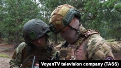 Илустрација - Борбена координација на воениот персонал на вооружените сили на Белорусија и борците на ПВК „Вагнер“ на полигонот „Брестски“
