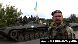 Українські військові під час звільнення Ізюма в Харківській області, вересень 2022 року