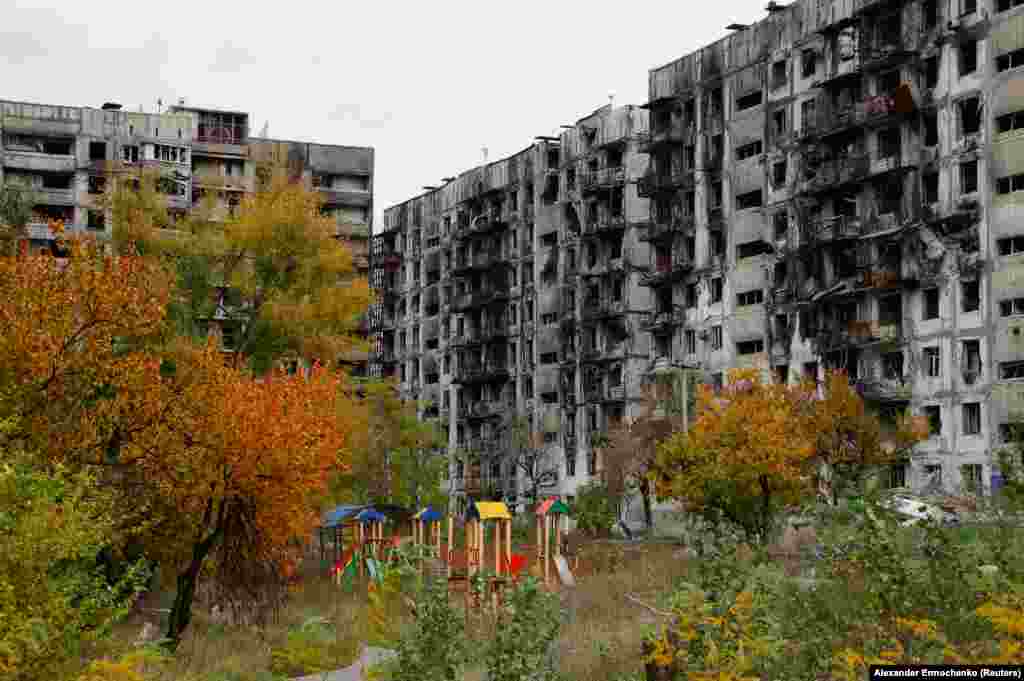 A child's playground in the courtyard of a ruined apartment block on October 29. Mariupol was once home to around 431,000 people. Less than a quarter of that number are estimated to remain in the city today. 