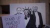 Плакат с изображением Дональда Трампа и Владимира Путина на антитрамповской демонстрации в Аризоне. Финикс, 22 августа 2017 года.