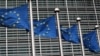 BELGIUM -- European Union flags fly outside the European Commission headquarters in Brussels, Belgium, March 6, 2019. 