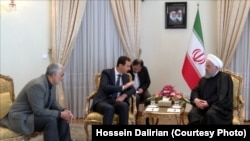 دیدار بشار اسد با حسن روحانی و با حضور قاسم سلیمانی، فرمانده نیروی قدس سپاه پاسداران.