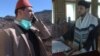 Bosnia and Herzegovina, Sarajevo, Muezzin in Gazi Husrev Bey's Mosque in Sarajevo calling for prayer and Chazzan in Ashkenazi Synagogue in Sarajevo. 7. April, 2020. 