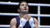 Mavzuna Chorieva reacts after losing the her semifinal boxing match at the London Olympic Games.