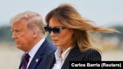 Претседателот на САД, Доналд Трамп и првата дама Меланија Трамп 