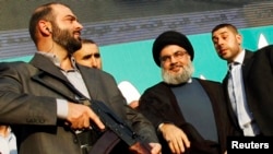 آقای بان در این گزارش به سخنان حسن نصر‌الله، رهبر حزب‌الله لبنان، در تابستان گذشته اشاره کرده، که گفته بود تمام هزینه‌ها و تسلیحات گروه او را ایران تامین می‌کند