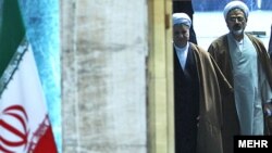 Ali Akbar Hashemi Rafsanjani (left), the "Shark" of Iranian politics