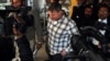 FILE: Raymond Davis (C) heading to a court in Lahore on January 28, 2011