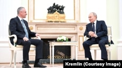 Бадра Гунба и Владимир Путин, 5 марта