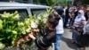 Bosnia and Herzegovina -- Citizens of Sarajevo in front of the Bosnian Presidency are paying their respect for the 19 Srebrenica genocide victims, who will be buried in Srebrenica on the July 11, in Sarajevo, July 9, 2021.