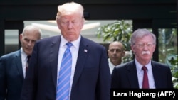 Predsednik SAD Donald Tramp i njegov dosadašnji savetnik za nacionalnu bezbednost Džon Bolton