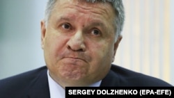 Ukrainian Interior Minister Arsen Avakov has acknowledged a relationship with the leadership of the National Corps and National Militia but says he does not support their ideology or activities.