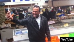 Pakistani-born fishmonger Muhammad Shahi Nazir sings in the YouTube "One-Pound-Fish Man" video from a London fish market.