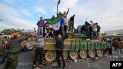 Rebelii din Siria susțin că au preluat controlul asupra capitalei.