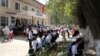 Окуучуларды митингге чыгарган кызмат талаш