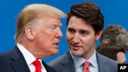 Дональд Трамп і Джастын Трудо. Архіўнае фота