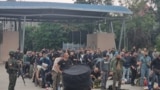 Mercenari români în timpul unei evacuări din Republica Democrată Congo. Nu e clar dacă și câți soldați din această imagine au lucrat sau nu în Armata Română.