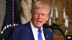 Președintele american Donald Trump, la conferința de presă de la Mar-a-Lago, Florida, din 18 februarie. 