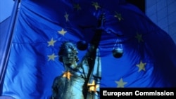 Belgium - The headquarters of the European Commission, EU Flag and Justice Statue, undated