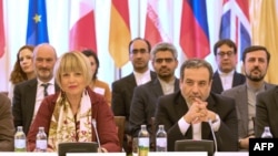 عباس عراقچی و هلگا اشمید در نشست کمیسیون مشترک برجام در روز جمعه
