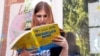 Учасниця зовнішнього незалежного оцінювання (ЗНО) з англійської мови в школі №80 в Харкові, архівне фото, 2018 рік