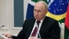 Путин потпиша декрет со кој ги обврзува паравоените борци да се заколнат на руското знаме