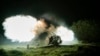 Ukrainian forces fire artillery toward Russian positions in the Kherson region on October 27.