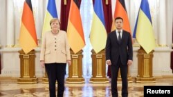 Украинскиот претседател Володимир Зеленски се сретна со германската канцеларка Ангела Меркел во Киев. 22.08.2021.