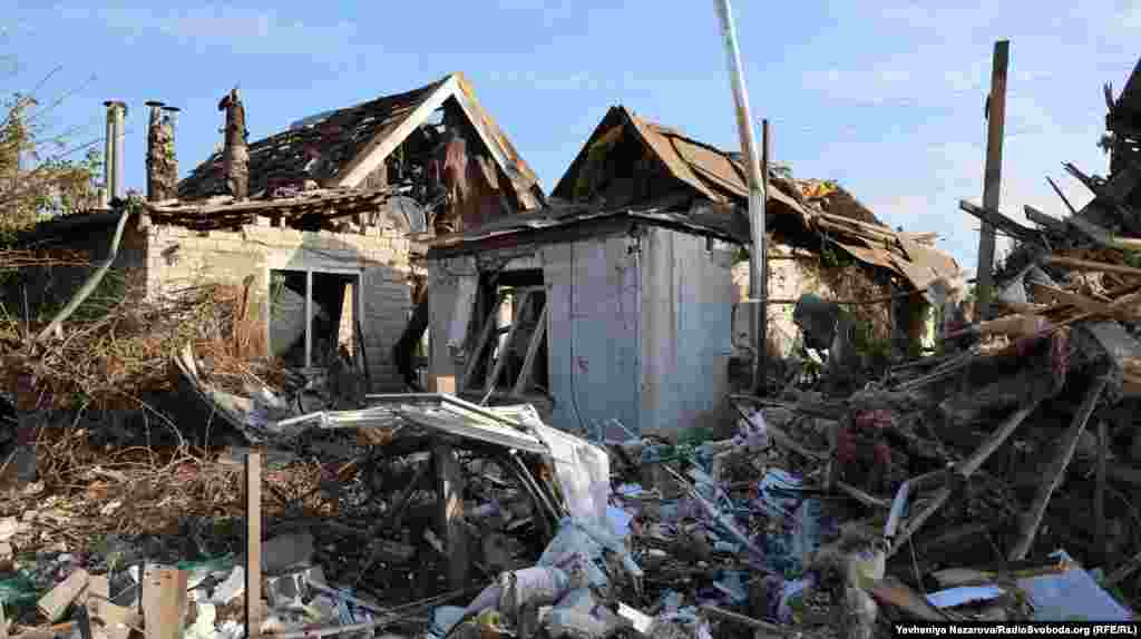 Houses destroyed by a Russian air strike in Ukraine's Zaporizhzhya's region. The governor said at least 29 buildings were heavily damaged in a wave of Russian strikes on October 10.
