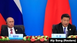 Лидерите на Русија и Кина, Владимир Путин и Си Џинпинг