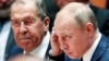 Руският външен министър Сергей Лавров и президентът Владимир Путин по време на конференцията за Либия в Берлин през 2019 г.