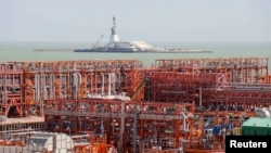 И Казахстан, и Туркменистан хотели бы повысить цену на нефть, но надежды у них при этом несколько разнятся (на снимке - нефтяное месторождение Кашаган).