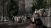Lithuania: Bodies of three US servicemen recovered from a swamp. A fourth serviceman, still wanted