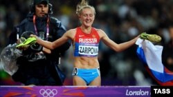 Юлія Заріпова після допінгової перемоги в бігу на 3000 м із перешкодами, Лондон, 7 серпня 2012 року
