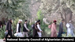 Newly freed Taliban prisoners leave Pul-e Charkhi prison in Kabul on August 13.