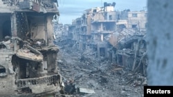 Силно оштетени згради за време на тековната израелска воена операција, во услови на судири меѓу Израел и Хамас, во Беит Лахија, северниот дел на Појасот Газа, на 18 декември 2024