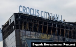 Обгоревшее здание "Крокус Сити Холла" после террористического нападения в марте 2024 года