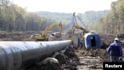 The European Commission believes it could play a role in negotiating energy-infrastructure deals on the EU's behalf.