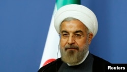 حسن روحانی می‌گوید ایران آماده است تا برای یافتن راه‌حل پای میز مذاکره هسته‌ای بنشیند- آنکارا٬ ۲۰ خرداد ۱۳۹۳