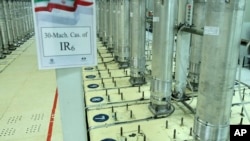 Fotografija koju je Iranska organizacija za atomsku energiju objavila 5. novembra 2019. prikazuje mašine za centrifugiranje u postrojenju za obogaćivanje uranijuma Natanz u blizini Natanza, Iran.