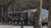 Є дві головні версії, що відбуватиметься у Херсоні. На фото: російські військові на площі Свободи у Херсоні, березень 2022 року